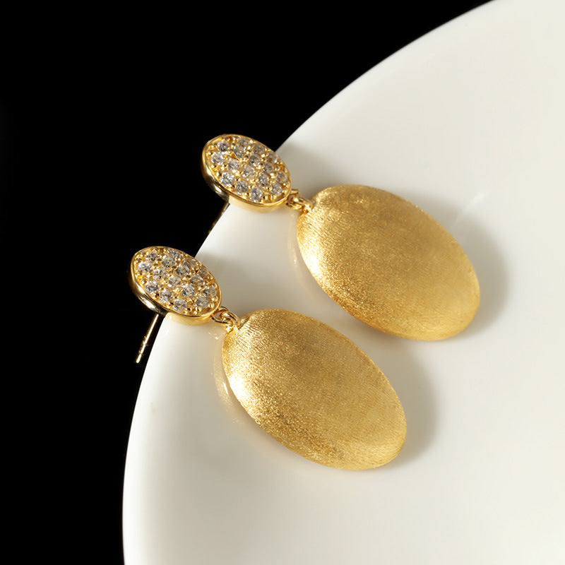 Niche hand-brushed zircon earrings