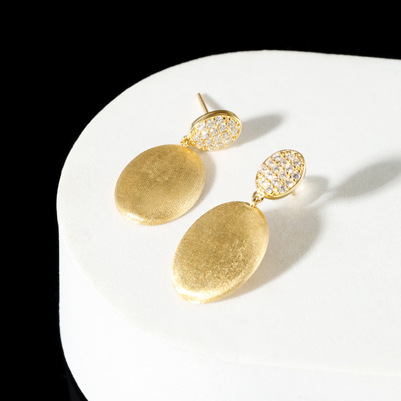 Niche hand-brushed zircon earrings