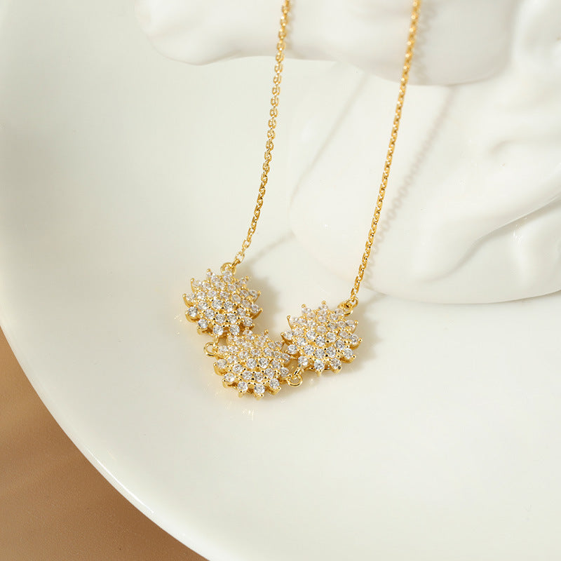 Golden sunflower pendant